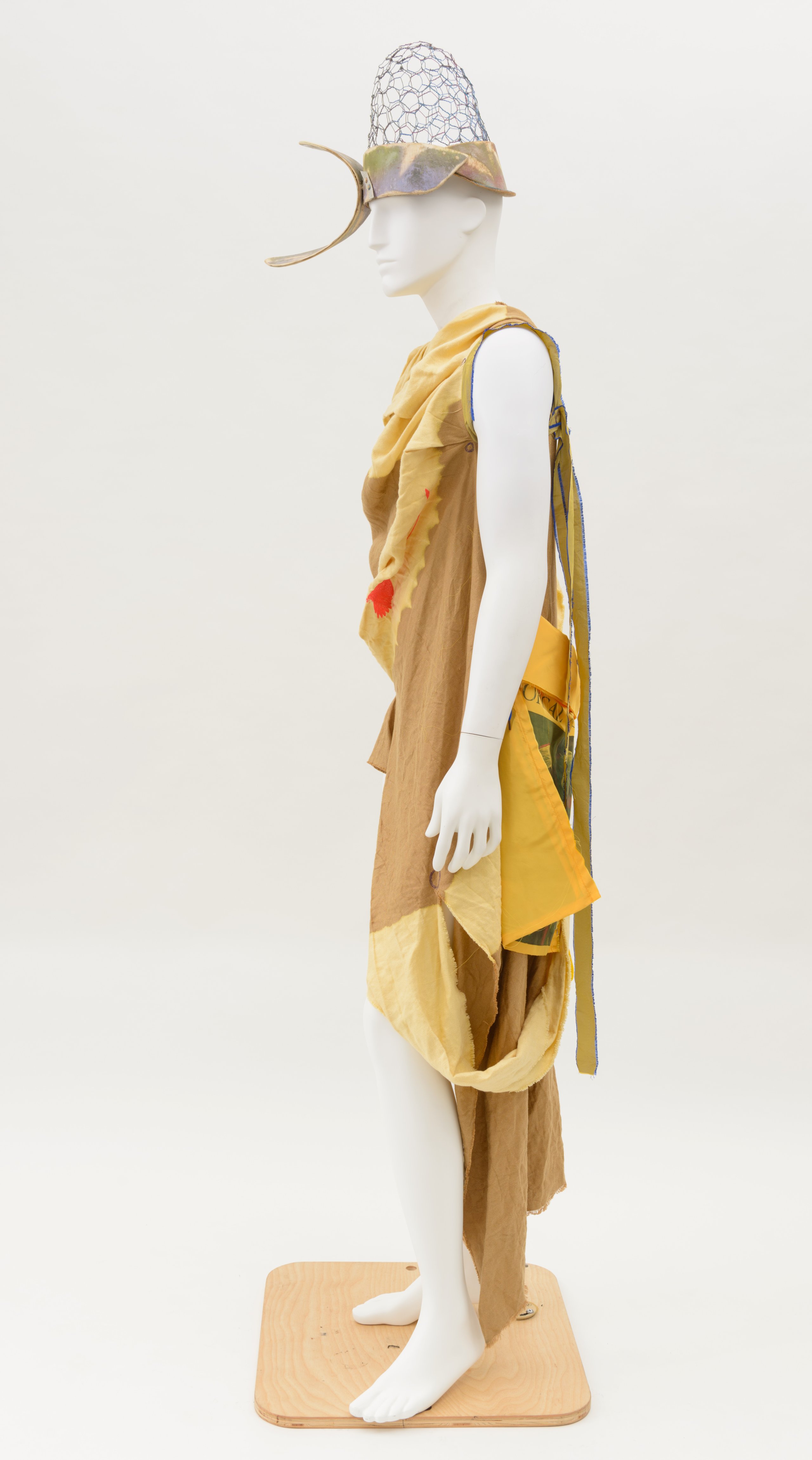 Dress, 'FIGURES IN LANDSCAPE' by Bernhard Willhelm and headpiece by Duane Paul