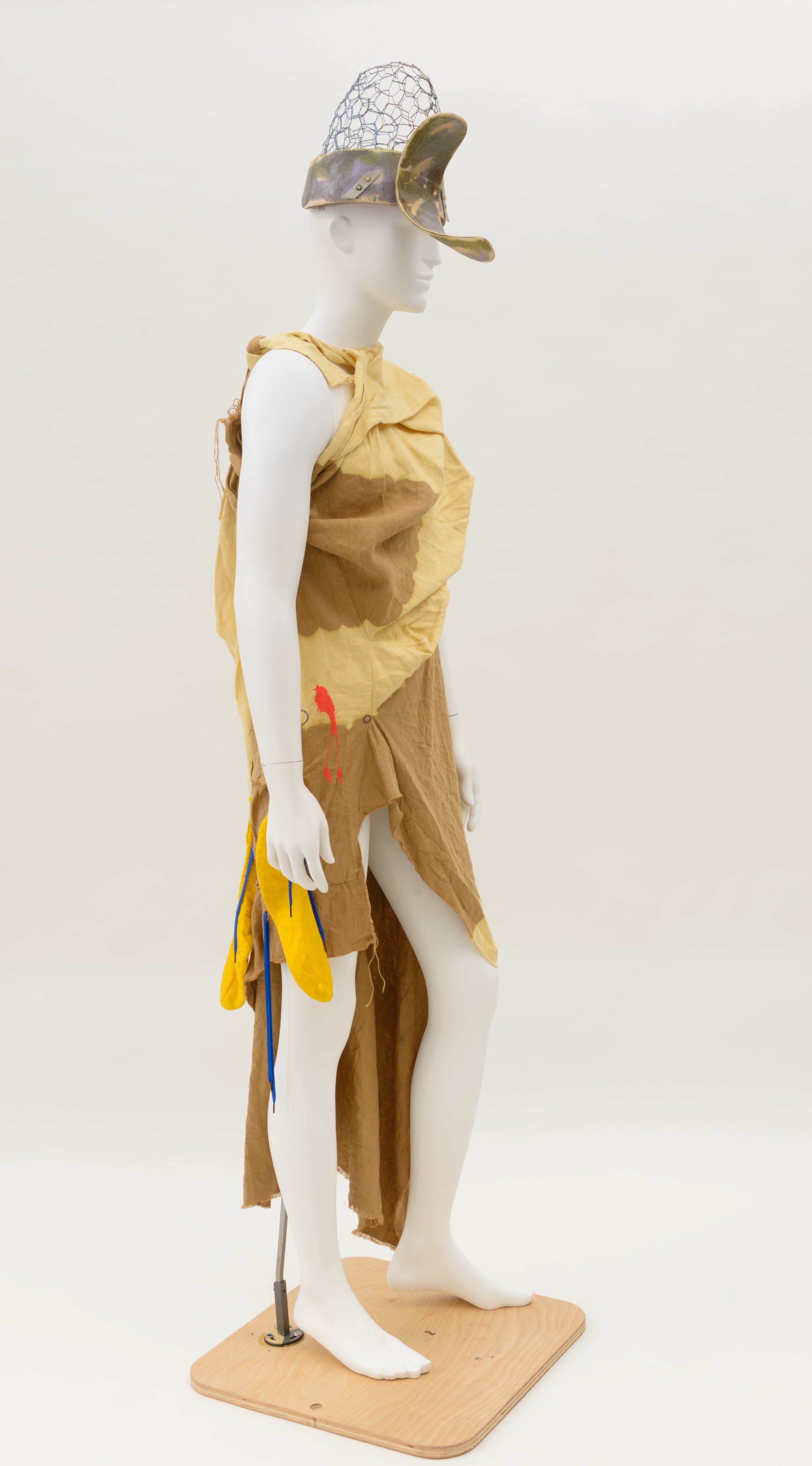 Dress, 'FIGURES IN LANDSCAPE' by Bernhard Willhelm and headpiece by Duane Paul