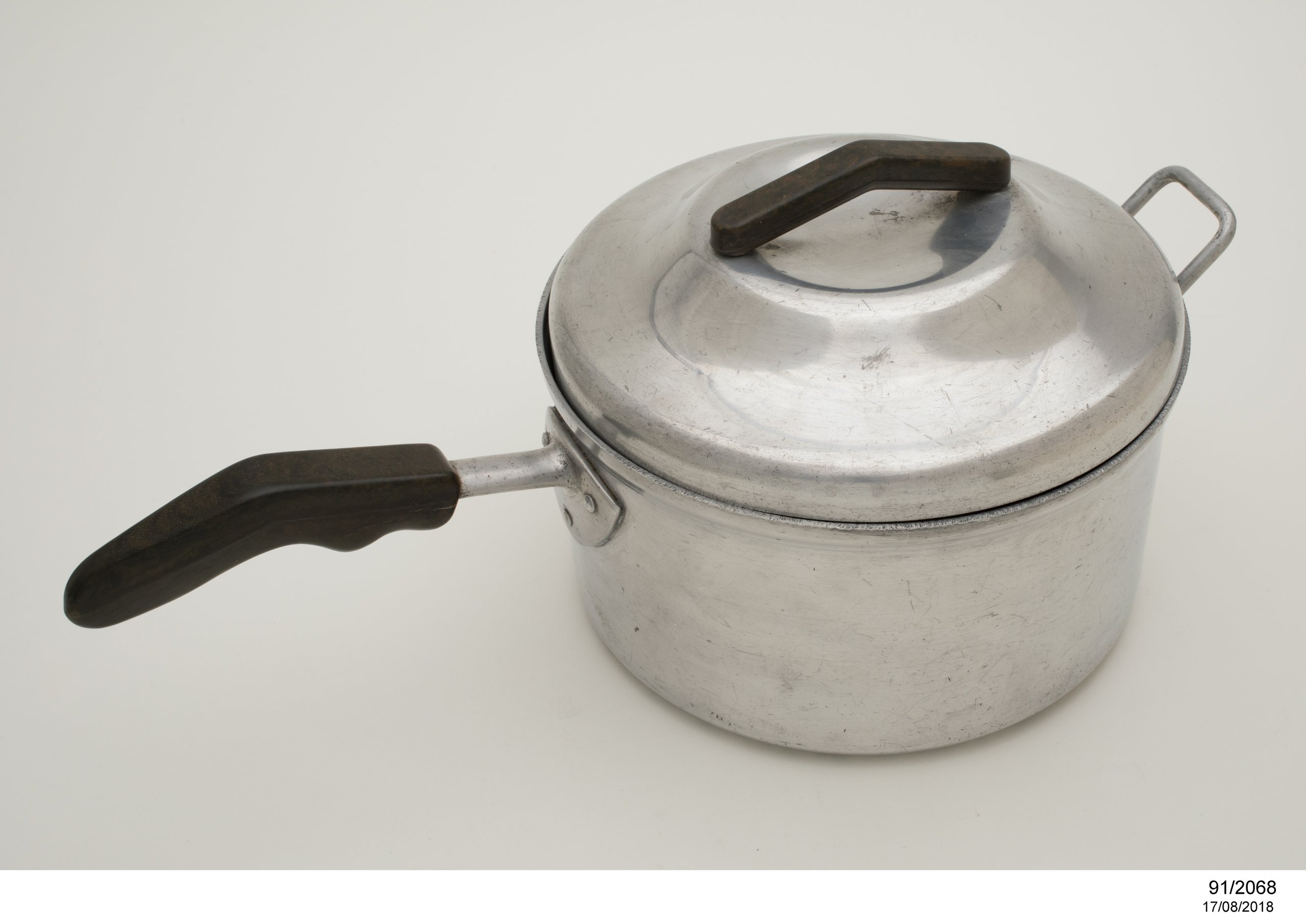 Saucepan with lid designed by Gordon Andrews