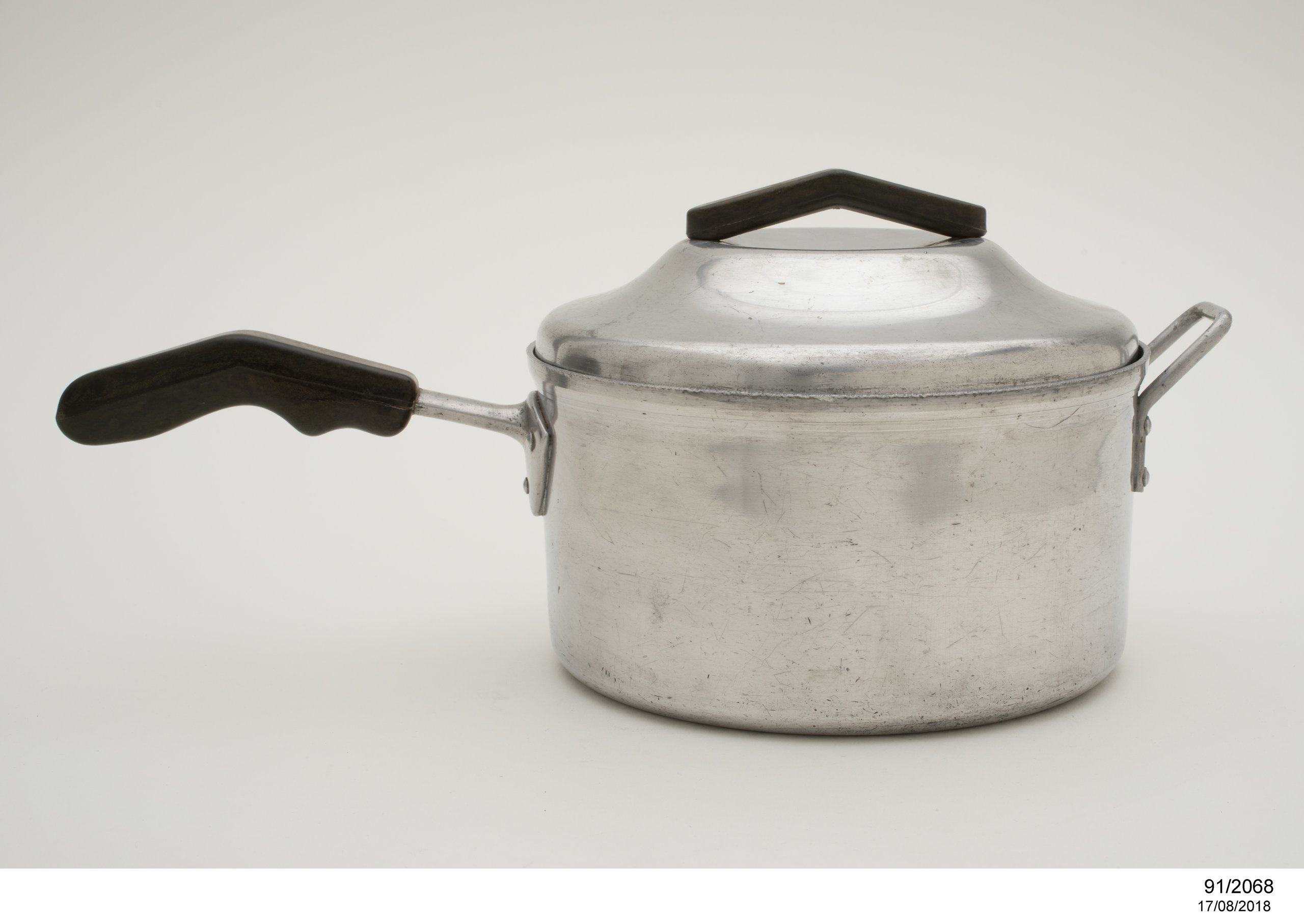 Saucepan with lid designed by Gordon Andrews