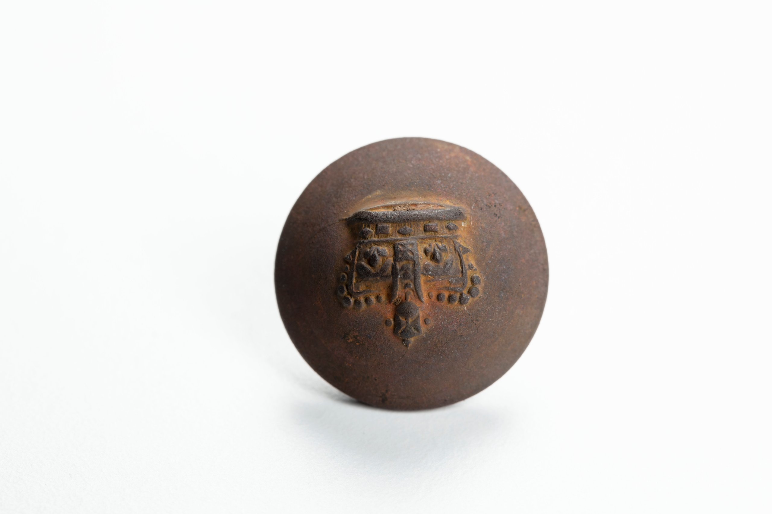 Button embossed with Queen Victoria crown