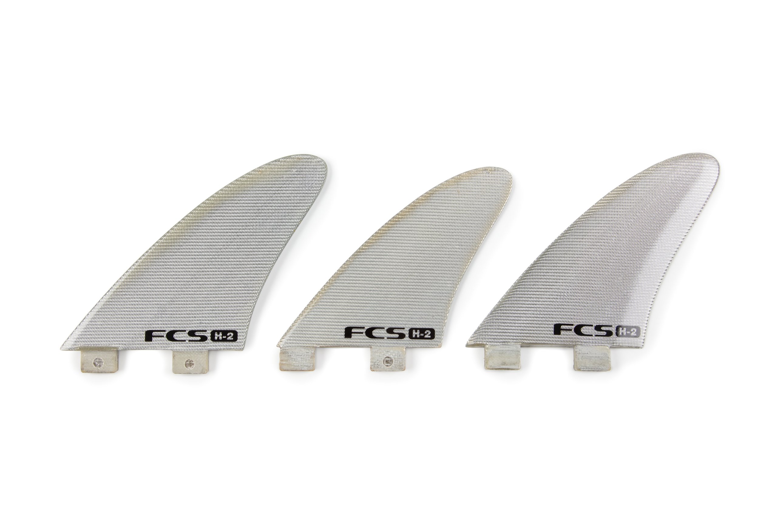 Three 'FCS H-2' surfboard fins