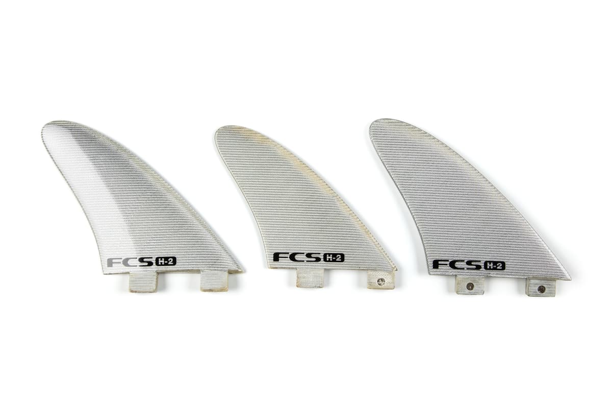 Three 'FCS H-2' surfboard fins - Powerhouse Collection