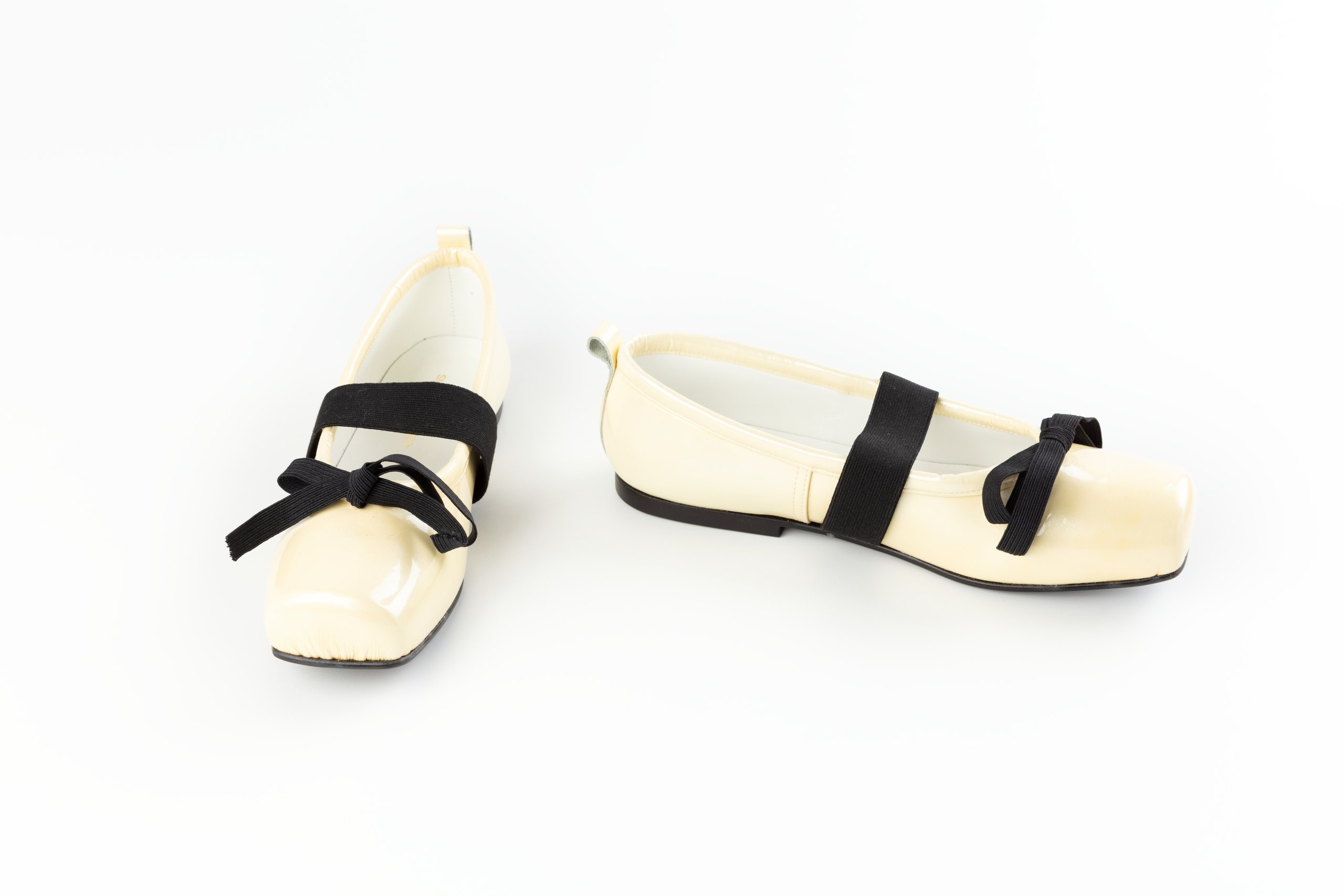 Pair of womens ballet slipper shoes by Rei Kawakubo for Comme des Garcons