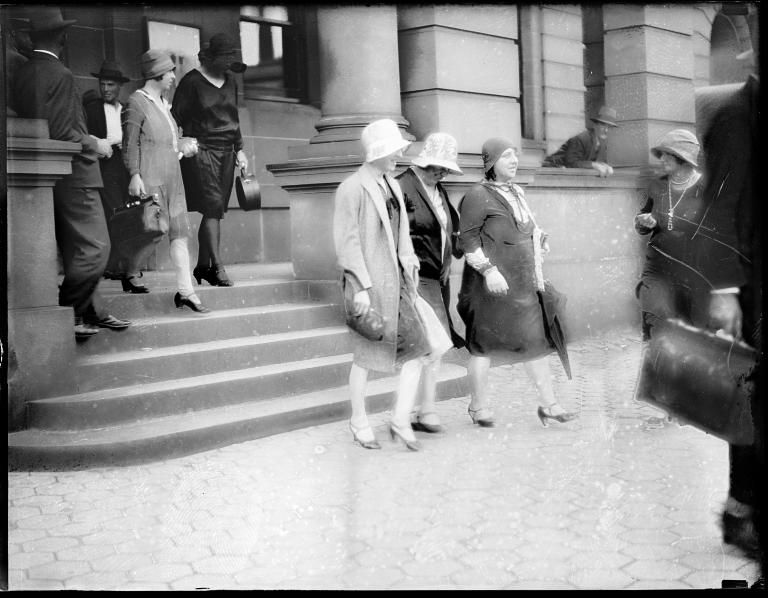 Glass plate negative of group exiting Central Police Court, Liverpool Street, Sydney photographed by Tom Lennon