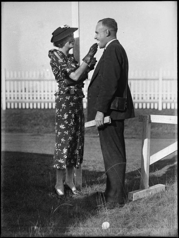 Glass plate negative of couple at Warwick Farm racecourse photographed by Tom Lennon