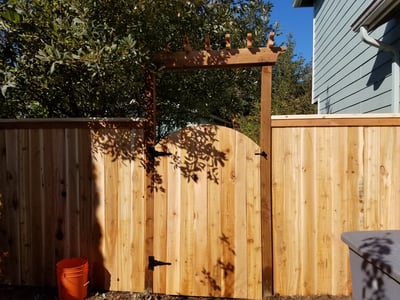 Wooden Arbor Over Gate