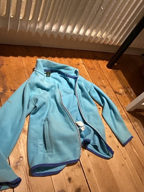 Blå fleecejacka,väldigt bra skick.