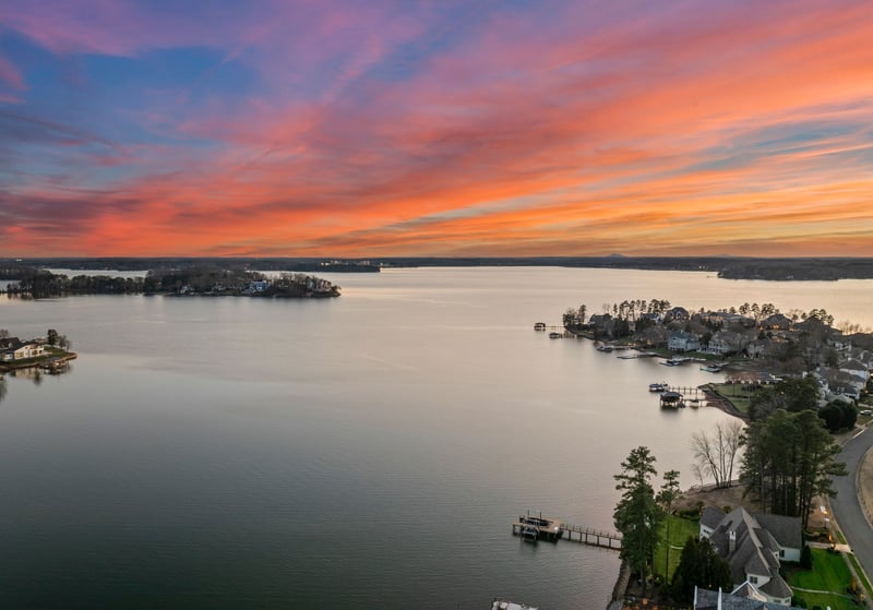 A residential area of Lake Norman, North Carolina, with waterfront homes, private docks and wooded shores.