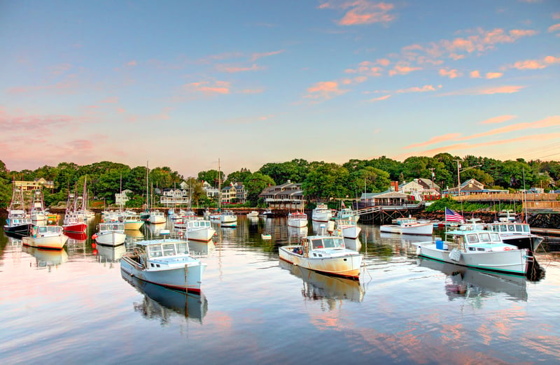 Fishing boats and waterfront buildings in Perkins Cove, Ogunquit, on the southern Maine coast.