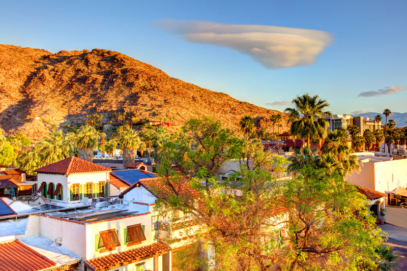 Downtown Palm Springs, California, beneath the desert mountains of the Coachella Valley.