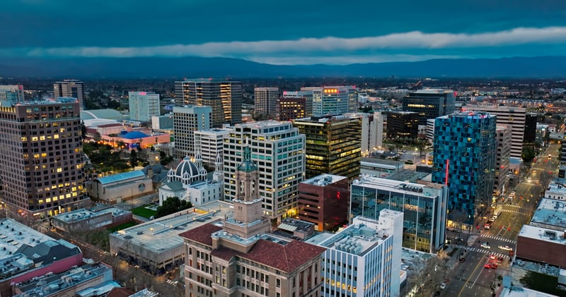 The Bank of Italy Building's spire above downtown San Jose, California, at sunrise.