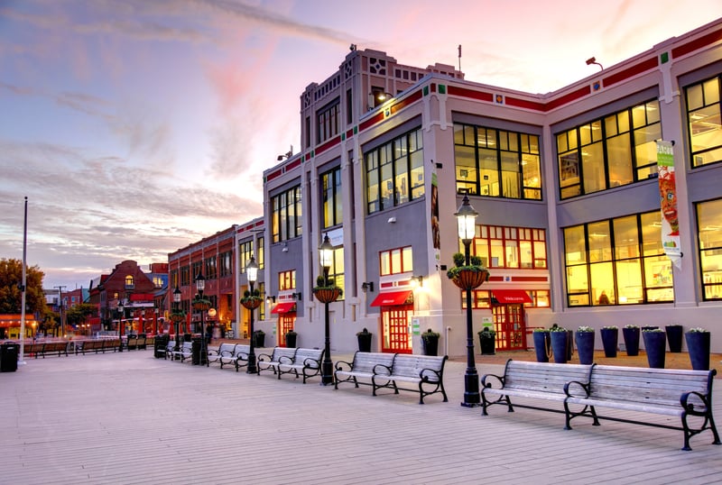 The Old Town Alexandria waterfront along the Potomac River in Virginia at dusk.