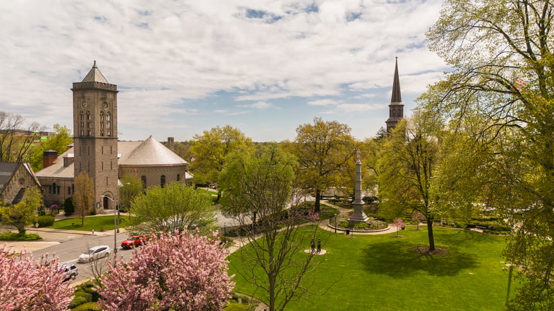 Cherry blossoms by Morristown Green and the First Presbyterian Church in Morristown, New Jersey.