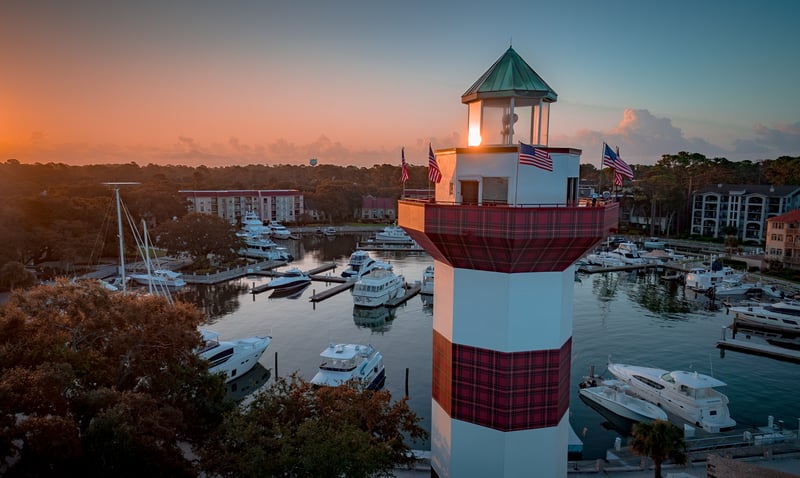 The Harbour Town lighthouse and marina on Hilton Head Island, South Carolina, at sunrise.