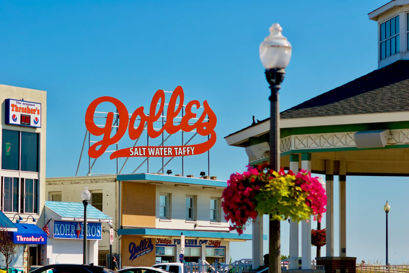 The historic Dolle's sign beside the boardwalk in Rehoboth Beach, Delaware.