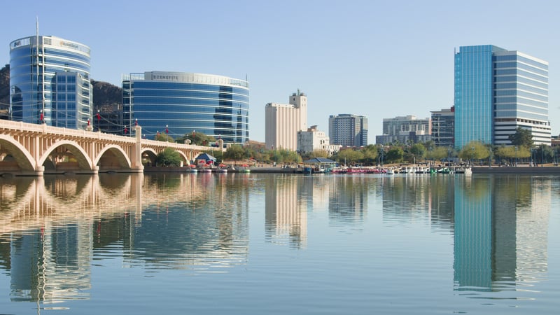 Mill Avenue Bridge across Tempe Town Lake with the downtown Tempe, Arizona, skyline beyond.