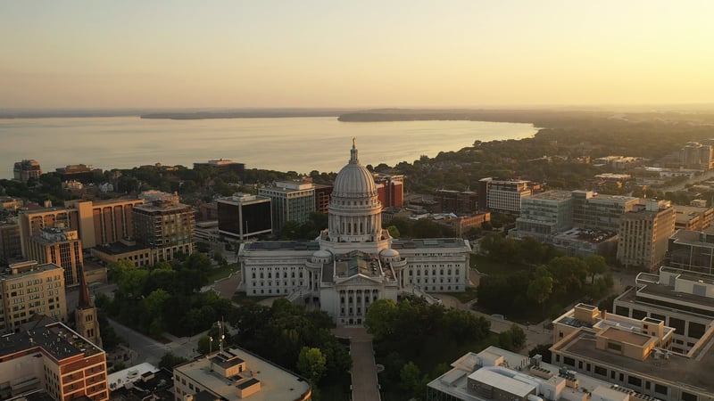 The Wisconsin State Capitol above downtown Madison, with the lake beyond.