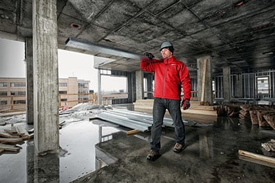Person wearing Milwaukee jacket on the jobsite