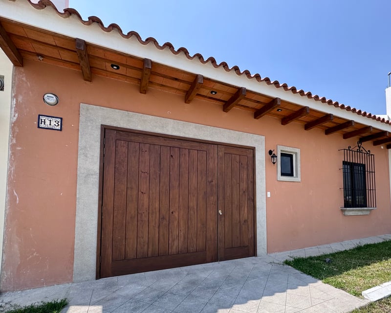 House for Sale: 3-Bedroom Gem with Garden in San Miguel Dueñas, Guatemala - $235,000