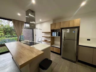 Modern 2-Bedroom Apartment in Zona 16, Guatemala City | Furnished, Parking, Garden | Rent $1900 - Image 3