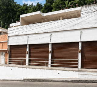 Propiedad para Inversiòn con  locales y apartamentos