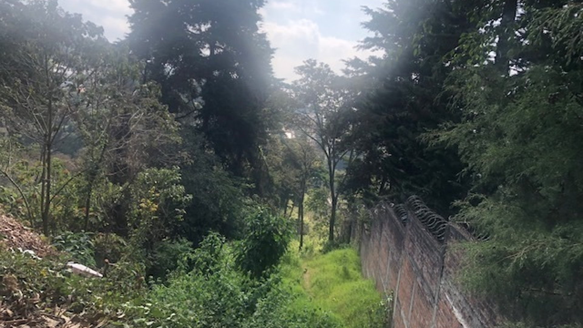 Terreno Muxbal, excelente ubicación sobre carretera