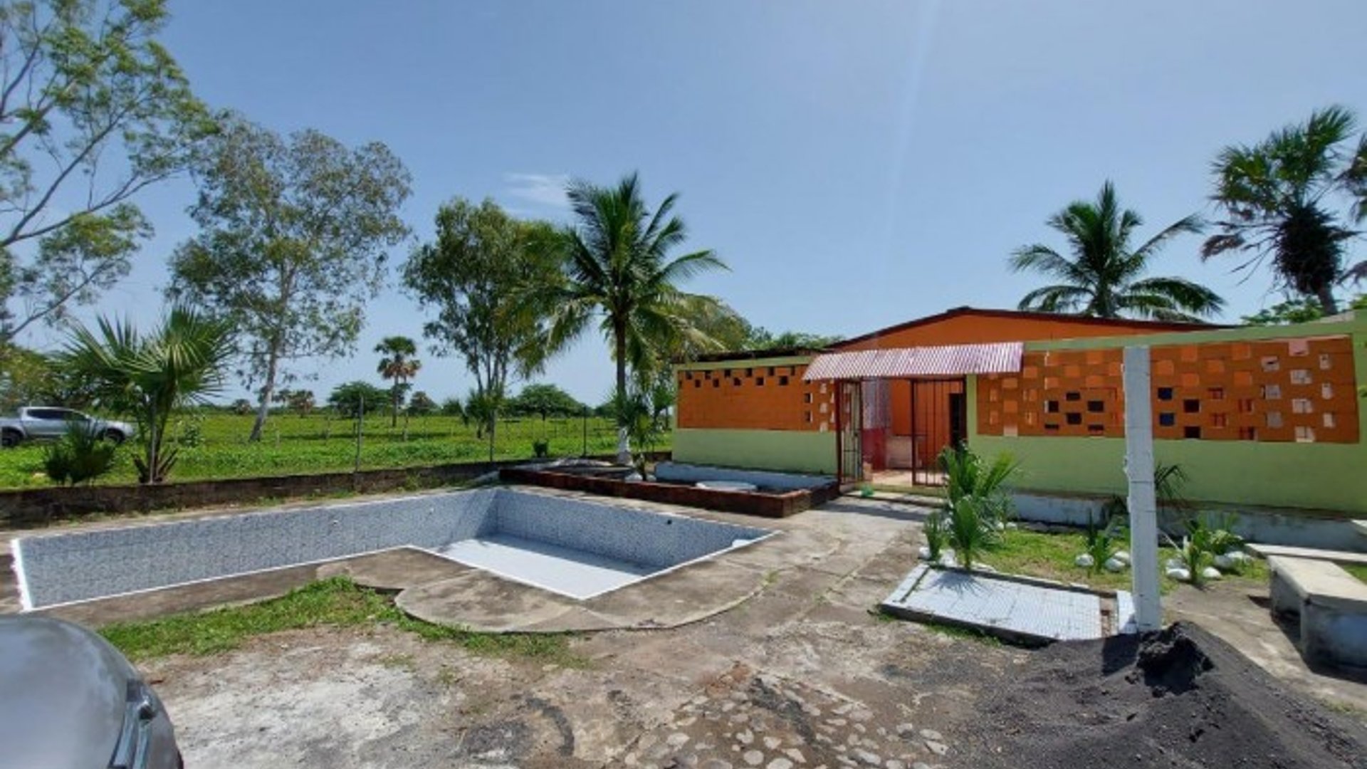 En venta  terreno y casa vacacional en Taxisco