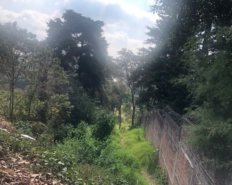Terreno Muxbal, excelente ubicación sobre carretera