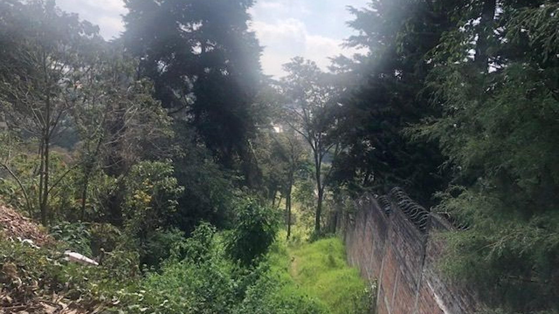 Terreno Muxbal, excelente ubicación sobre carretera